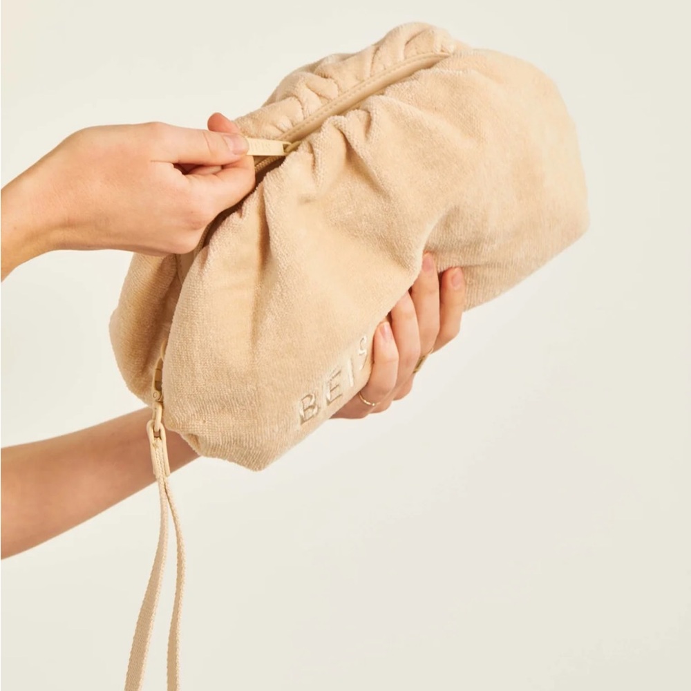 The Terry Cosmetic Clutch 
in Beige